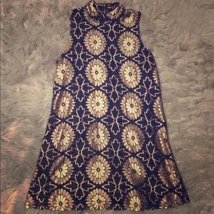 Beautiful black and gold dress or top